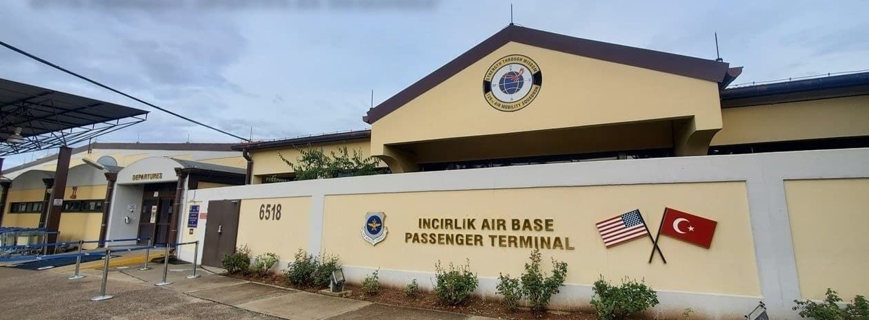 The passenger terminal at Incirlik Air Base, Turkey, with U.S. and Turkish flags.
